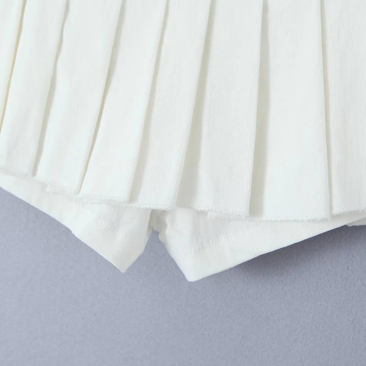 YENKYE 2023 Cool Girl Y2K American Retro Pleated Mini Skirt Sexy Low Waist Side Button Women Summer Skirts With Shorts Lining